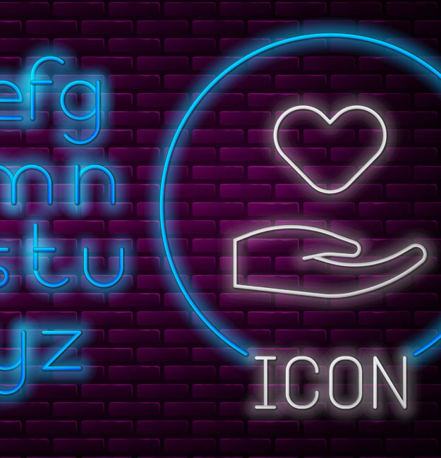 Glowing Neon Line Heart In Hand Icon Isolated On Brick Wall Back